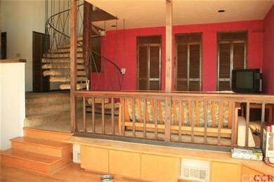 View looking from dining room toward entry and liv