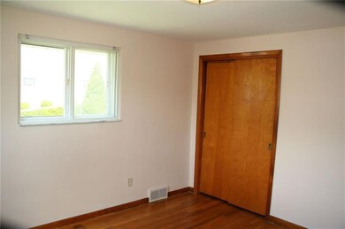 Exposed hardwood floors , natural  light and good 