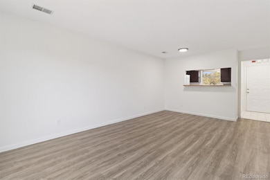 Family room looking towards dining and kitchen