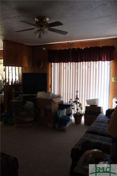 Sliding glass door leads to the back patio.