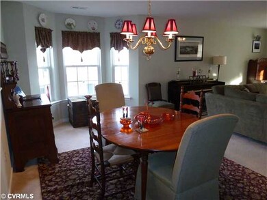 Dining Room - Dining room with bay window and open