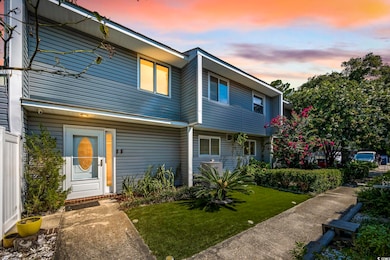View of front of home with a yard