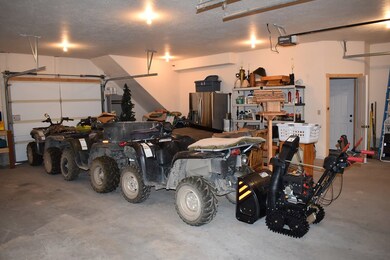 finished garage with 2 openers