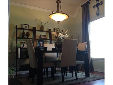 Freshly Painted Dining Room with Laminate Flooring
