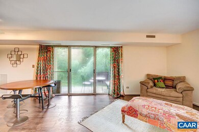 The expansive living/dining room has a tranquil vi