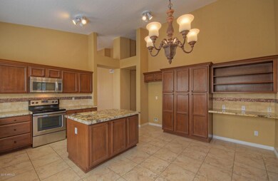 Kitchen with pantry and desk