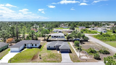 Aerial view of residential area with a tree filled landscape