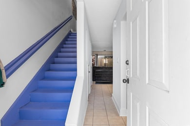 Stairway with tile patterned flooring