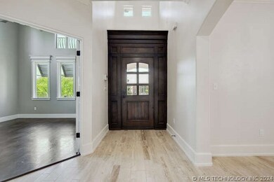 View into entry way, office to the left of this ph