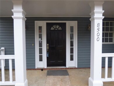 Welcome home!  Deep porch perfect for greeting gue