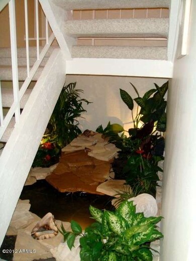 Fountain under stairway