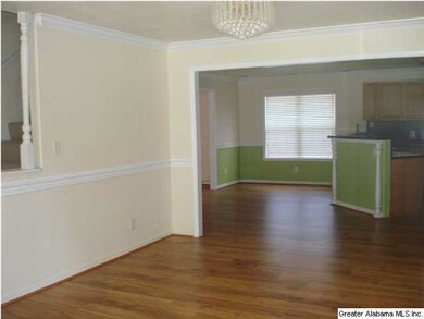 FORMAL DINING ROOM LEADS INTO KITCHEN