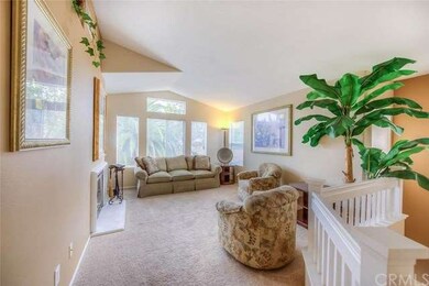 High ceilings and overlook make the living room ex