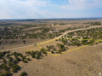 Overview of rural landscape with property boundaries highlighted and a desert landscape