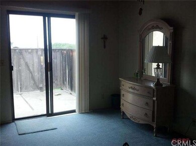Patio area just off of this bedroom. Open the gate