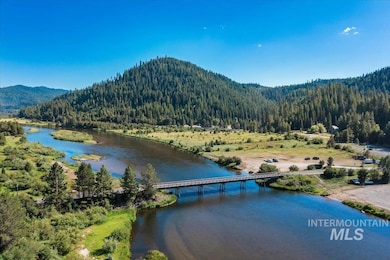 Bird's eye view of a water and mountain view and a notable bridge