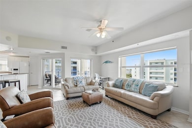 DOUBLE GLASS DOORS TO THE PATIO OFF THE LIVING ROOM