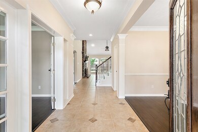 Welcome home to 15802 Bennet Chase! All new interior paint. Entry has accent tile and crown molding.