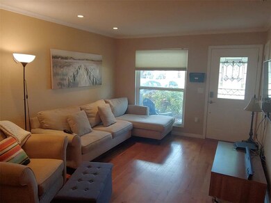 Family room with beautiful wood flooring