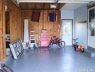 Garage One car attached garage between house and R