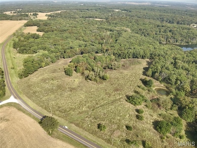 Aerial view of property's location with rural landscape