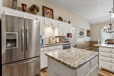 Kitchen stainless steel appliances and island