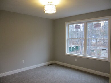 There is a 3/4 bath just off the hallway to this b