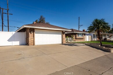 Large Driveway with RV or extra parking on left side, 2 car garage with direct access to house