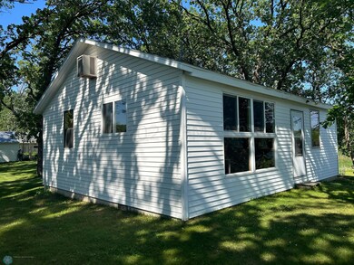 Nestled Under Mature Shade Trees