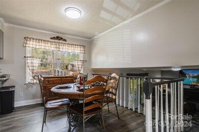 Enjoy eating your meals in the morning gathered in the dining nook next to the large window overlooking the backyard