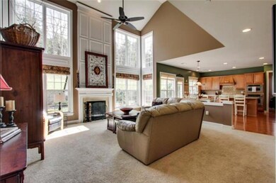 Expansive Great Room w Gas Fireplace and Loads of Windows!