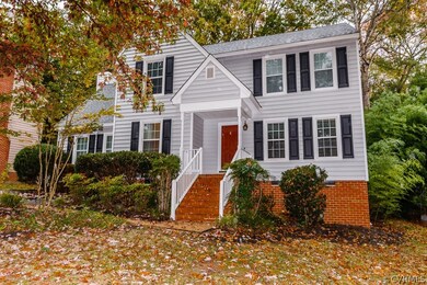FRONT EXTERIOR W/ VINYL SIDING, PAVED DRIVEWAY, ST