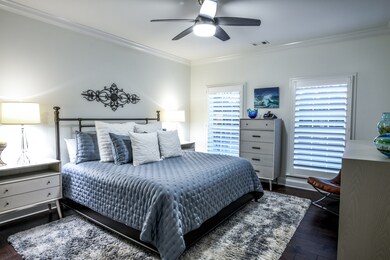Master bedroom easily accommodates large king size furniture.