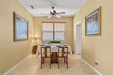Dining space featuring light tile patterned floors