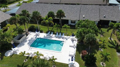 Community pool featuring a patio area