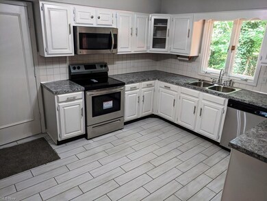 The spacious updated kitchen offers a lot of cabin