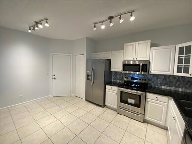 Brand new appliances in kitchen with space for kit