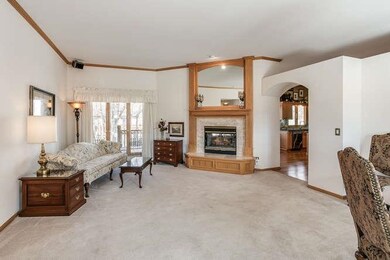 Two way fireplace shared with hearth kitchen.