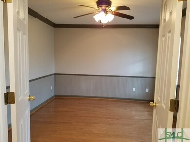 Double door entrance into formal living room or st