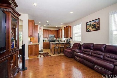 Open Floor Plan Connecting Family Room to Kitchen