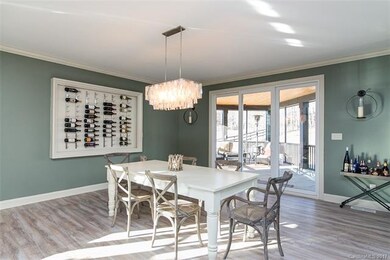 dining room with lighted built in wine rack