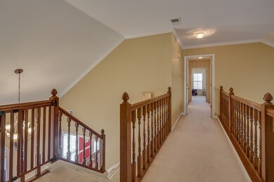 Open plan with a cat-walk balcony that overlooks t