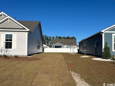 View of space between this home and neighbors