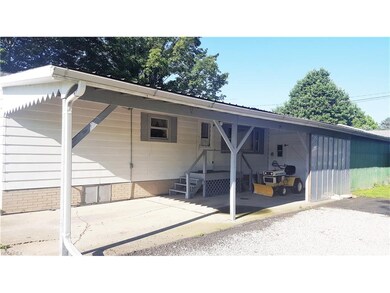 Rear Patio and Garage (compact car)