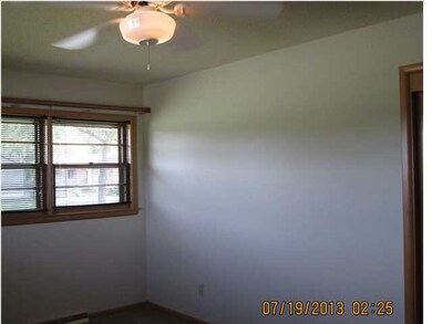 The front bedroom has a lot of natural light and a