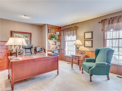 A Large Office/Den is located off the Foyer.