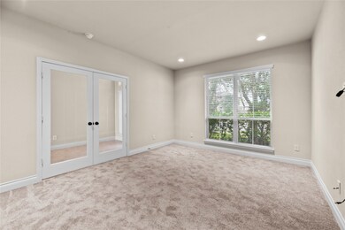 The glass doors offer the option to keep the space