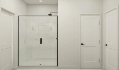 Primary bath with glass shower enclosure