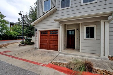 Garage with concrete driveway