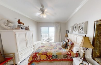 Bedroom featuring access to exterior, ornamental molding, and ceiling fan